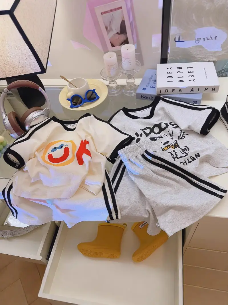Off-White Short-Sleeve Kids Suit with Smile Graphic - Image 2