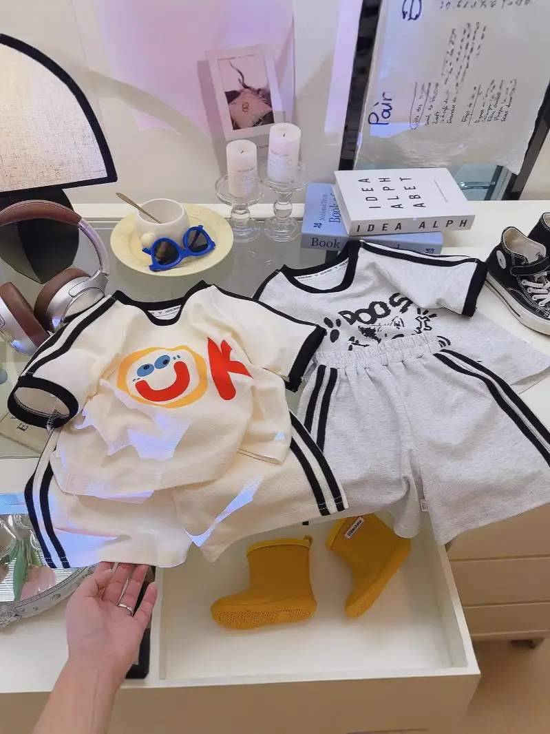 Off-White Short-Sleeve Kids Suit with Smile Graphic - Image 3