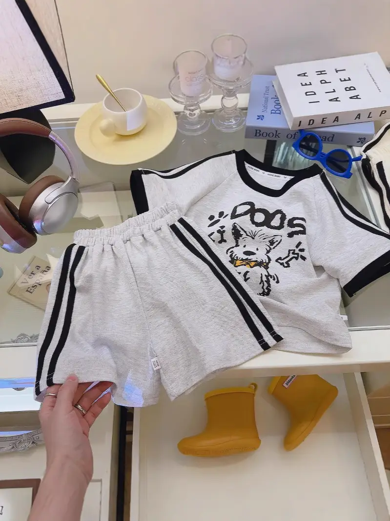 Off-White Short-Sleeve Kids Suit with Smile Graphic - Image 4