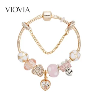 Gold Toned Bracelet with Peach Hearts & Diamond Accents
